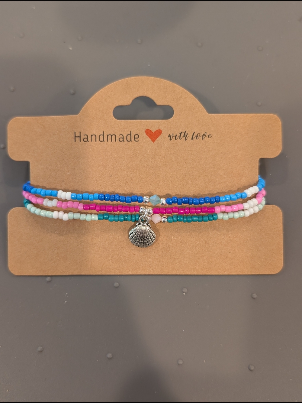 Hand Crafted Multicolor Beaded Bracelet with Shell Charm